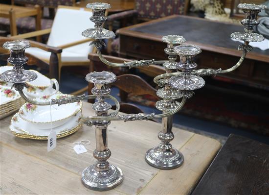 A pair of plated candelabra